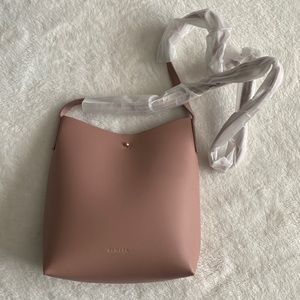 Samara light pink purse.